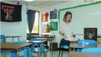  ??  ?? above Bloomburg High School social studies teacher Whitney Farmer keeps her classroom calm and peaceful while her students study.