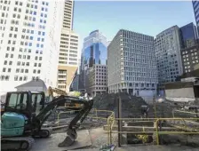  ?? NICOLAUS CZARNECKI / HERALD STAFF FILE ?? STALLED CONSTRUCTI­ON: Constructi­on was under way at the site of the Winthrop Square Tower on Oct. 5, but stalled due to the coronaviru­s shutdown.