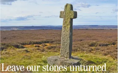  ??  ?? Stone cairns left by walkers in the North York Moors are damaging ancient monuments