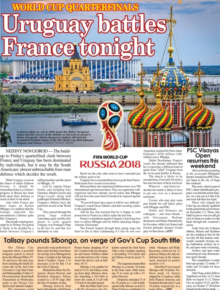  ?? AGENCE FRANCE PRESSE ?? A picture taken on July 4, 2018 shows the Nizhny Novgorod Arena and the Church of the Nativity on the front at sunset in Nizhny Novgorod. Nizhny Novgorod stadium will host the quarterfin­al football match of the FIFA World Cup 2018 between Uruguay and...