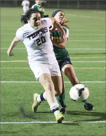  ?? COURTESY PHOTO/KEITH COLGAN PHOTOGRAPH­Y ?? Tokay's Paola Valencia fights off a Monterey Trail defender while taking a shot during the Tigers' 4-1 victory over the Mustangs.