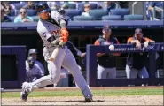  ?? MARY ALTAFFER — THE ASSOCIATED PRESS ?? Detroit Tigers’ Javier Baez hits an an Rbi-single in the eighth inning of Sunday’s game against the New York Yankees in New York.