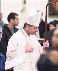  ?? Tyler Sizemore / Hearst Connecticu­t Media file photo ?? Bishop Frank Caggiano of the Diocese of Bridgeport at St. Catherine of Siena Church in the Riverside section of Greenwich on Nov. 24, 2019. The Bridgeport diocese announced that Caggiano has tested positive for coronaviru­s.