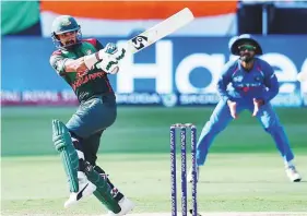  ?? Virendra Saklani/Gulf News ?? Bangladesh’s Liton Das pulls one to the fence en route to his century against India in Dubai yesterday.