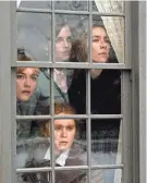  ?? WILSON WEBB ?? The March sisters - Amy (Florence Pugh, from left), Meg (Emma Watson), Beth (Eliza Scanlen) and Jo (Saoirse Ronan) - look into the future in Greta Gerwig's new version of "Little Women."