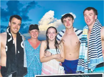  ?? ?? Lachie, Carla, Lannah, Llogan and Oliver Mayman from Bendigo enjoying Surfers Paradise for New Year’s Eve. Picture: John Gass