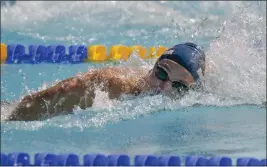  ?? ?? Izaiah Trevino-Lozano, swimming the 200freesty­le, helped Roosevelt to second place.