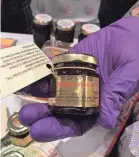  ?? CARLY MALLENBAUM/USA TODAY ?? CBD has been added to foods like jam (pictured, from Flower of Life), olive oil, gummy candies and coconut oil.