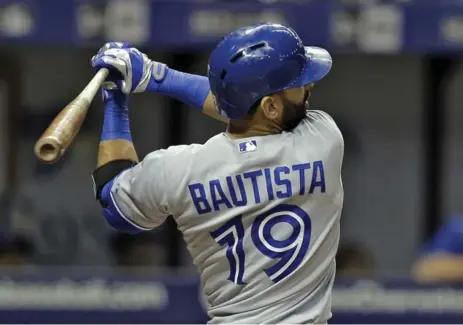  ?? CHRIS O’MEARA/THE ASSOCIATED PRESS ?? Toronto’s Jose Bautista homers off Matt Andriese during a four-run sixth inning. The Jays have scored four or more runs in an inning 28 times this year.