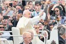 ?? TIZIANA FABI AFP VIA GETTY IMAGES Pope Francis made several loops around St. Peter’s Square in his popemobile following Sunday’s Easter Mass. ??