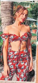  ??  ?? REDDY TO RELAX Roz stunning in beachwear