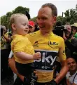  ??  ?? Chris Froome celebrates his Tour title with son Kellan