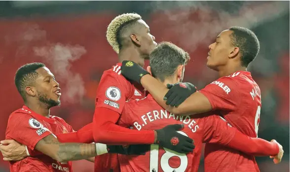  ?? Daily Mail ?? Manchester United players celebrate their win against Aston Villa.
Photo: