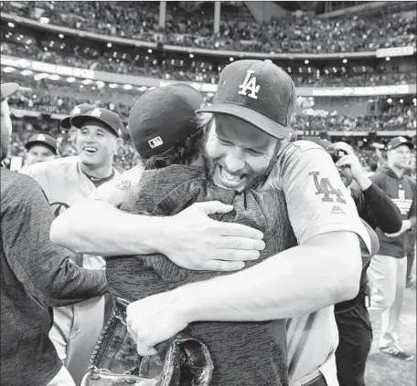  ?? Wally Skalij Los Angeles Times ?? CLAYTON KERSHAW, who pitched the ninth inning in relief, celebrates the Dodgers’ return trip to the World Series. Kershaw said he’s “thankful that I’ve been on a team that’s been this good for this long, to be in a position to even have a chance to win a World Series.”