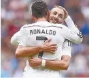  ?? ?? Karim Benzema and Cristiano Ronaldo celebrate together in Real Madrid's win over Deportivo La Coruna in 2014.