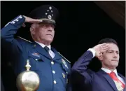  ??  ?? Cienfuegos and Peña Nieto in 2016