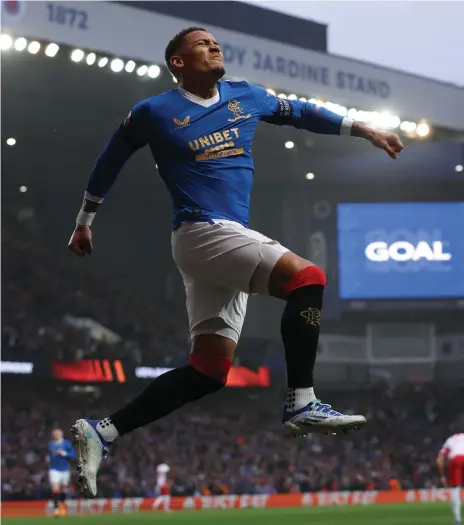  ?? Getty ?? James Tavernier celebrates scoring Rangers’ first goal in the Europa League semi-final second leg against RB Leipzig at Ibrox