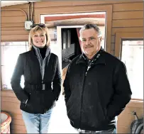  ??  ?? The DeLucs say the full-size 1912 caboose and 1940s boxcar they are selling would make a good tiny home, office or place to display a model train collection.