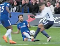  ??  ?? Over the top: Erik Lamela (left) and Jan Vertonghen commit reckless tackles on Cesc Fabregas and Eden Hazard