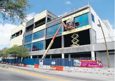  ?? SUSAN STOCKER/SOUTH FLORIDA SUN SENTINEL ?? The new L.A. Lee YMCA/Mizell Community Center on Sistrunk Boulevard is under constructi­on on March 3 in Fort Lauderdale. The 65,000-squarefoot community center plans to open in the fall with a pool, preschool, classrooms and a theater.