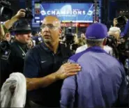  ?? ROSS D. FRANKLIN — THE ASSOCIATED PRESS FILE ?? Penn State head coach James Franklin, front left, greets Washington head coach Chris Petersen, right, after the Fiesta Bowl on Dec. 30 in Glendale, Ariz.