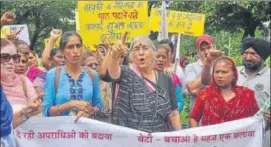  ?? SANT ARORA /HT ?? Subhasini Ali, chief of All India Democratic Women's Associatio­n, protests with others against son of Haryana BJP president, Subhash Barala, in Panchkula on Tuesday.