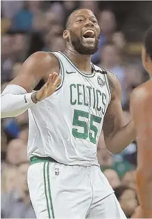  ?? STAFF PHOTO BY MATT STONE ?? HAPPY TO BE OUT THERE: Greg Monroe, who didn’t play on Monday, is glad to be back on the court for last night’s game against the Hornets at the Garden.