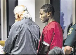  ?? LANNIS WATERS / THE PALM BEACH POST ?? Steny Louis, 17, appears in court Tuesday, charged with murder in the death of Einstein Mondesir. He’ll be back in court today with a new lawyer.