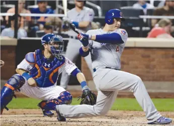  ?? | FRANK FRANKLIN II/ AP ?? Anthony Rizzo follows through after hitting an RBI double in the third inning Tuesday night.