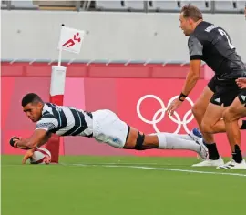  ?? Photo: Martin Seras Lima ?? Meli Derenalagi goes in for a try against New Zealand in the Tokyo Olympics 2020.
