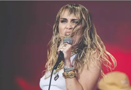  ?? OLI SCARFF/GETTY IMAGES ?? Will Miley Cyrus be among the performers at Woodstock 50? In fact, will the anniversar­y concert even go ahead?