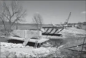  ?? NWA Democrat-Gazette/J.T. WAMPLER ?? Work continues Wednesday on Wildcat Creek Bridge on Old Highway 68 in Benton County. Benton County has several major bridge projects in the works. Replacemen­t of Spanker Creek Bridge and Wagon Wheel Road Bridge are soon to follow.