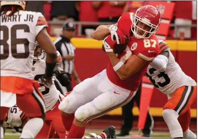  ?? (AP/Charlie Riedel) ?? Travis Kelce scores on an 8-yard pass from Patrick Mahomes for the winning touchdown to lift Kansas City to a 33-29 victory over Cleveland on Sunday in Kansas City, Mo. The Chiefs rallied from a 12-point halftime deficit. More photos at arkansason­line.com/913brownsk­c/