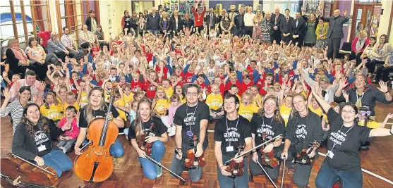  ?? Picture: Gareth Jennings. ?? Pupils from St Pius and Claypotts Castle primaries enjoying the programme with the Big Noise musicians.