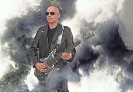  ??  ?? Joe Satriani found a niche audience for himself, becoming the best-selling solo guitar player of all time. JOSEPH CULTICE