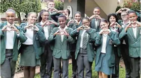  ?? ?? KIND HEARTS: Pupils at Victoria Park celebrate Valentine's Day recently