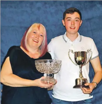  ??  ?? Ladies’ and gents’ champions: mother and son Donna MacLean and Andrew Forbes.