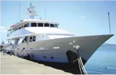  ?? —AP ?? TUNIS: The 5 Fishes, a 32-meter yacht that belonged to Belhassen Trabelsi, the brother-in-law of former Tunisian President Zine El Abidine Ben Ali, is anchored in Goulette harbor, outside Tunis, yesterday. The boat was shown to media after being...