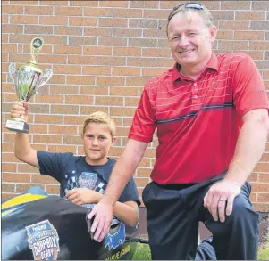  ?? ALYSHA CAMPBELL/JOURNAL PIONEER ?? Bradley Hardy is shown with Trevor Smith from the P.E.I. Bag Company, the car’s sponsor. The car Hardy will be racing is already on its way to Ohio where the Internatio­nal Championsh­ips are held.