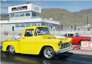  ?? CAM HUTCHINS ?? A 1955 Chevy pickup gets a little air as it runs to a quickest time of 11.43 seconds in the quartermil­e during last weekend’s Langley Loafers Old Time Drags in Ashcroft.