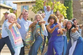  ?? Jonathan Prime / Associated Press ?? Foreground from left, Julie Walters, Pierce Brosnan, Amana Seyfried and Christine Baranski in a scene from “Mamma Mia! Here We Go Again.”