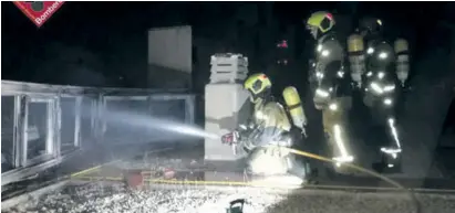  ??  ?? Firefighte­rs putting out the blaze on the rooftop of the Benidorm tower block