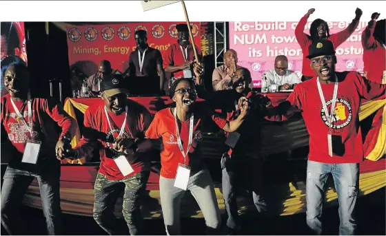  ?? /VELI NHLAPO ?? NUM members sing and dance during the elective national congress which is on in Boksburg, Ekurhuleni.