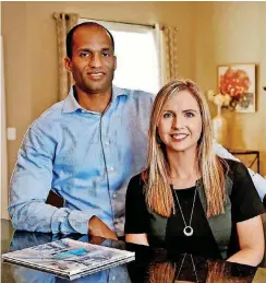  ?? [PHOTO BY CHRIS LANDSBERGE­R, THE OKLAHOMAN ARCHIVES] ?? Kenyon and Brandi Woods, co-owners of Authentic Custom Homes, are shown in one of the company’s model homes, which are closed on Sundays.