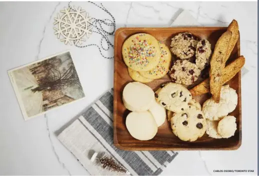  ?? CARLOS OSORIO/TORONTO STAR ?? The first six cookies in the 2016 cookie calendar are clockwise from top left, Cake Mix Cookies, No Bake CranberryL­emon Oat Cookies Maple-Walnut Biscotti, Amaretti, Classic Chocolate Chip and Basic Buttery Shortbread.