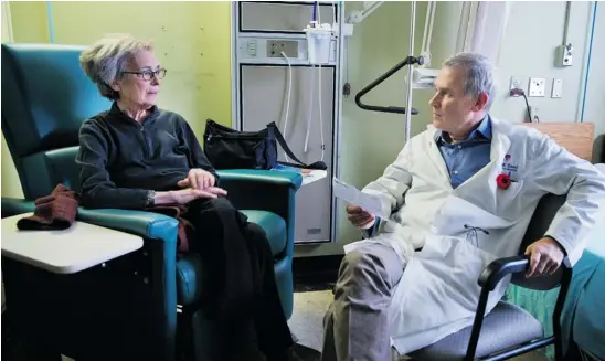  ?? VINCENZO D’ALTO/POSTMEDIA NEWS ?? Dr. Manuel Borod talks with patient Lynne Cohen at the Montreal General Hospital. Borod, one of Canada’s top palliative care doctors, struggles with how he will deal with a request for a doctor-hastened death if it becomes legal in Quebec. ‘I would...