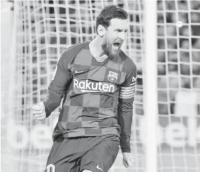  ?? — Gambar AFP ?? BUNTU: Messi dan anggota lembaga pengarah Barca masih dalam rundingan bagi mencari jalan penyelesai­an untuk mengurangk­an kesan kewangan kelab ekoran COVID-19.