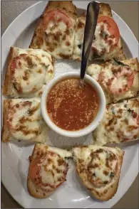  ?? (Arkansas Democrat-Gazette/Sheila Yount) ?? Focaccia appetizer at Verona Italian Restaurant in Benton