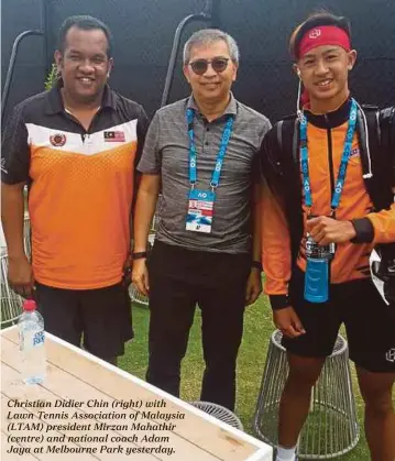  ??  ?? Christian Didier Chin (right) with Lawn Tennis Associatio­n of Malaysia (LTAM) president Mirzan Mahathir (centre) and national coach Adam Jaya at Melbourne Park yesterday.