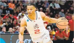  ?? NAM Y. HUH AP ?? The agent for Miami’s Isaiah Wong wants the same $800,000 name, image, likeness deal for Wong that he negotiated for Nigel Pack, a player who recently transferre­d to Miami.